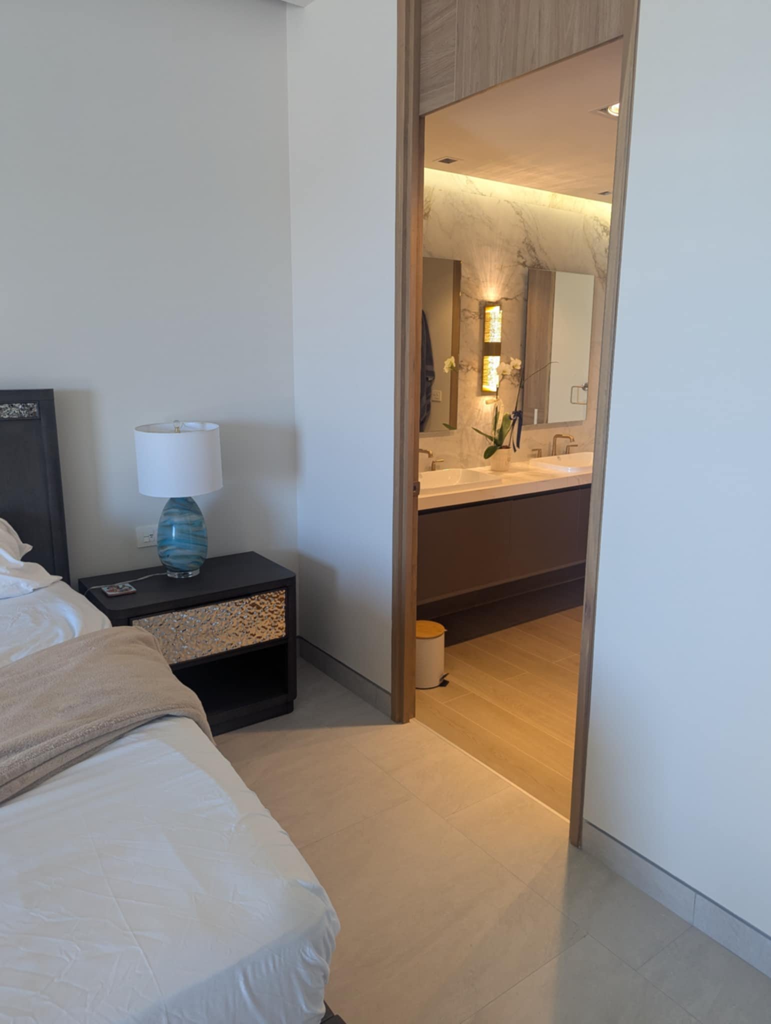 King bedroom with en-suite bathroom and double vanity visible
